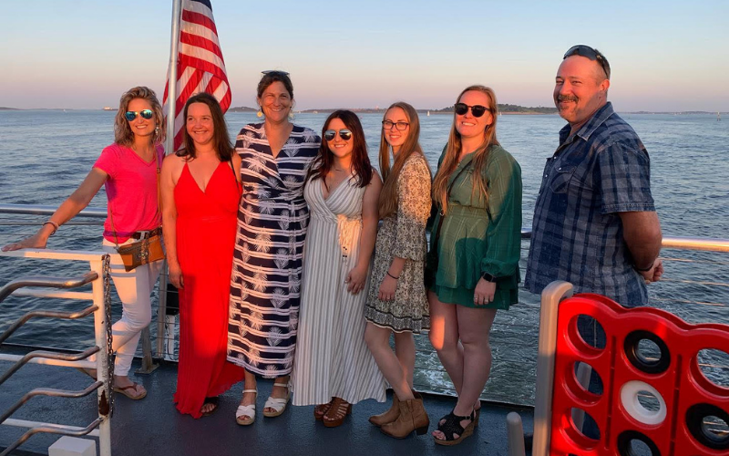 Hanson Grain Co. family posed on a pier.